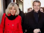 presiden-perancis-emmanuel-macron-dan-istrinya-brigitte-trogneux_20170630_153047.jpg
