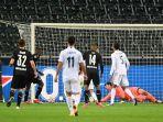 proses-gol-kedua-penyerang-borussia-moenchengladbach-marcus-thuram-ke-real-madrid.jpg