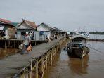 pulau-hanaut-tempat-habitat-buaya-muara-di-sun-tan-berada-di-bantaran-sungai-mentaya.jpg