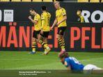 raphael-guerreiro-dan-erling-haaland-saat-dortmund-menang-4-0-atas-schalke.jpg