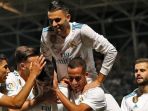 real-madrid-merayakan-gol-yang-dicetak-marco-asensio-ke-gawang-fuenlabrada_20171027_061459.jpg