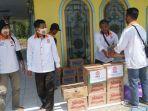 rombongan-dpd-pks-batola-serahkan-bantuan-korban-puting-beliung-desa-sungai-rasau-cerbon.jpg