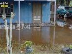rumah-warga-yang-sempat-tergenang-akibat-sungai-mentaya-sampit-meluap.jpg