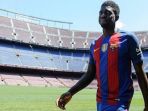 samuel-umtiti-diperkenalkan-sebagai-pemain-baru-barcelona_20180203_054122.jpg