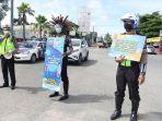 satlantas-polres-banjarbaru-sosialisasi-tentang-covid-19.jpg