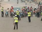 sejumlah-polisi-lalulintas-melakukan-operasi.jpg