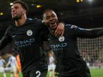 selebrasi-gelandang-manchester-city-raheem-sterling-kanan-bersama-kyle-walker-huddersfielkd_20171127_074913.jpg