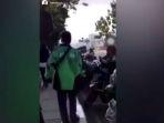 seorang-tukang-ojek-online-terekam-video.jpg