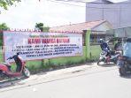 spanduk-penolakan-penggusuran-pasar-batuah-di-kelurahan-kuripan-kota-banjarmasin-2402022.jpg