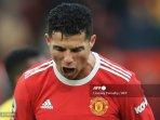 striker-manchester-united-asal-portugal-cristiano-ronaldo-bereaksi.jpg