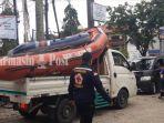 sukarelawan-pmi-banjarmasin-pmi-kalsel-evakuasi-korban-banjir-handil-bakti-batola-18012021.jpg