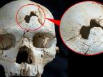 tengkorang-berusia-430-ribu-tahun-yang-diduga-berasal-dari-korban-pembunuhan_20150528_123453.jpg