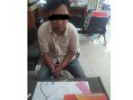 terduga-pelaku-w-25-menyerahkan-diri-ke-polsek-banjarmasin-tengah.jpg