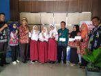 tiga-peserta-didik-min-1-kapuas-yang-sukses-meraih-gelar-juara-pada.jpg