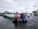 tim-baznas-tanggap-bencana-kalsel-evakuasi-korban-banjir.jpg
