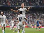 toni-kroos-merayakan-gol-ke-gawang-celta-vigo-bersama-lucas-vazquez_20161014_072820.jpg