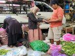 transaksi-jual-beli-di-pasar-Agrobisnis-Baraba1.jpg