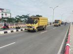 truk-angkutan-sedang-melintasi-jembatan-sei-alalak.jpg