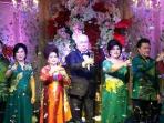 utomo-wijaya-dan-istrinya-kumala-kusuma_20151101_215337.jpg