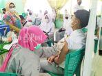 vaksinasi-dosis-kedua-di-sman-4-banjarmasin-kalimantan-selatan-selasa-09112021.jpg
