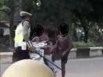 video-viral-bocah-ngamuk-dan-banting-motornya-saat-ditilang-polisi-di-tapin-kalsel-01.jpg