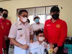 wakil-bupati-hss-syamsuri-arsyad-dan-kepala-binda-kalsel-heri-memantau-vaksinasi-15022022.jpg