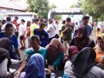 warga-banjarmasin-utara-ikuti-cek-kesehatan-gratis-di-event-senam-banjar_20170409_093518.jpg