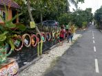 warga-banua-anyar-membenahi-kawasan-kumuh_20180505_221442.jpg
