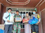warga-terdampak-longsor-dapat-sembako-di-desa-satui-barat-Rabu-26102022.jpg