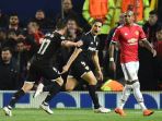 wissam-ben-yedder-dan-pablo-sarabia-merayakan-gol-sevilla-ke-gawang-manchester-united_20180314_070608.jpg