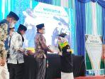 wisuda-ke-xxxiii-tktp-al-quran-di-aula-serbaguna-sit-al-khair-kota-barabai-kamis-06012022.jpg