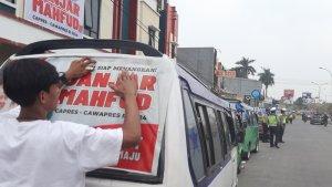 Sejumlah-angkot-di-Banten-ditempeli-stiker-Siap-Menangkan-Ganjar-Mahfud-MD.jpg