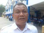 Foto-Kepala-Dinas-Ketenagakerjaan-Disnaker-Kota-Tangerang-Ujang-Hendra-Gunawan.jpg