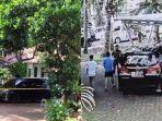 Garis-polisi-terpasang-di-mobil-Toyota-Alphard-di-mana-Brigadir-Ridhal-Ali-Tomi-ditemukan-tewas.jpg