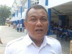 Kepala-Disnaker-Kota-Tangerang-Ujang-Hendra-Gunawan.jpg