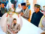 Pernikahan-kakek-74-tahun-dengan-gadis-24-tahun-di-Pacitan.jpg