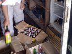 Polsek-Pamarayan-menyita-botol-berisikan-minuman-beralkohol-merek-miras.jpg