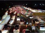 Situasi-arus-lalu-lintas-arus-mudik-pada-H-4-Lebaran-2024-di-Gerbang-Tol-Cikupa-11e3r.jpg