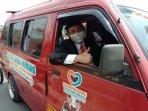 helldy-agustian-sanuji-pentamarta-kendarai-angkot-saat-daftar-ke-kpu.jpg