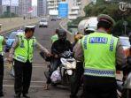 ilustrasi-polantas-menilang-pengendara.jpg