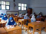 pembelajaran-tatap-muka-ptm-pertama-saat-ppkm-pandemi-covid-di-smp-negeri-1-rangkasbitung.jpg