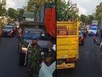 viral-video-sopir-truk-vs-rombongan-tni-di-jalan-ranuyoso-lumajang-jawa-timur.jpg