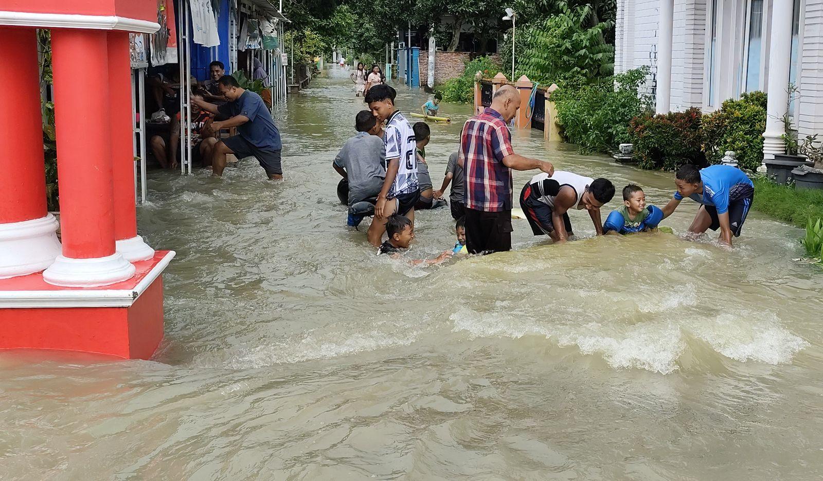 banjir-main-air.jpg