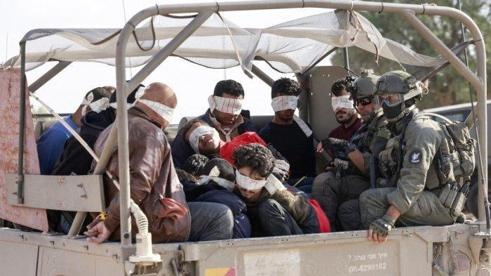 tentara-israel-memindahkan-sandera-warga-palestina.jpg