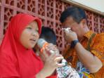 10102025-gubernur-jateng-ahmad-luthfi-mengusap-air-mata-di-wonogiri.jpg