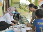 18062025-korban-banjir-rob-tayu-pati-dapat-pengobatan-gratis.jpg