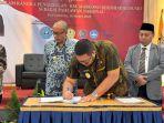19032025-Wakil-Bupati-Purbalingga-Dimas-Prasetyahani-tanda-tangan-komitmen.jpg