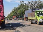 29062025-aktivitas-truk-keluar-masuk-pelabuhan-tanjung-emas-semarang.jpg