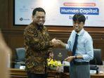 CEO-Kuncie-Hendra-Saputra-dan-Deputy-Director-of-MBA-Program-FEB-UGMgfdgfd5h5.jpg