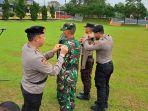 TNI-polri-gelar-diklat-bersama-di-spn-polda-jateng-purwokerto-jelang-pengamanan-pemilu-2024.jpg